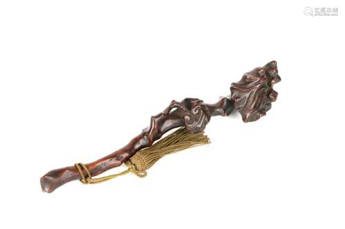 a chinese wood ruyi scepter