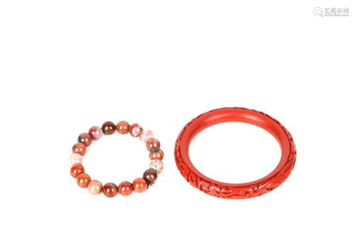 a chinese agate hand string and lacquered bracelet