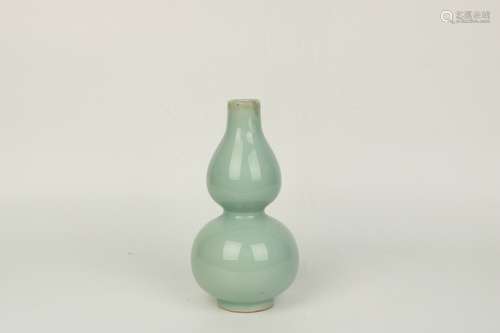 a chinese celadon glazed porcelain gourd vase