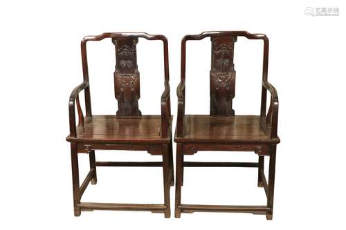 a pair of chinese huanghuali armchairs