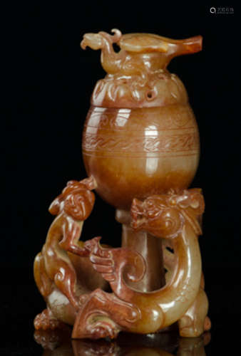 AN ANTIQUE JADE CENSER CARVED WITH BEAST