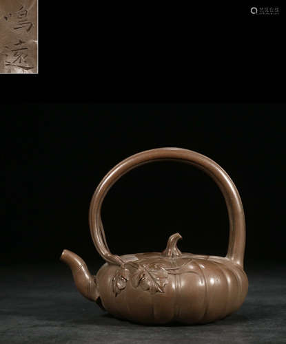 A ZISHA TEA POT SHAPED WITH MELON