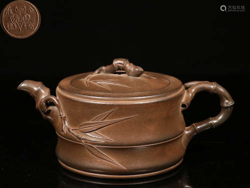 A ZISHA TEA POT CARVED WITH BAMBOO PATTERN