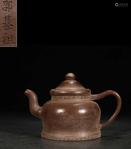 A ZISHA TEA POT CARVED WITH LANDSCAPE PATTERN