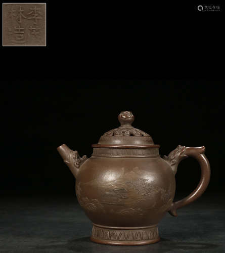 A ZISHA TEA POT CARVED WITH LANDSCAPE PATTERN