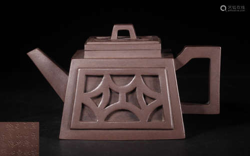 A ZISHA TEA POT CARVED WITH POETRY