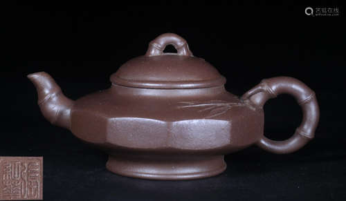 A ZISHA TEA POT CARVED WITH BAMBOO PATTERN