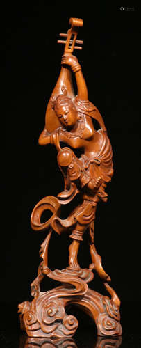 A HUANGYANG WOOD FIGURE STATUE