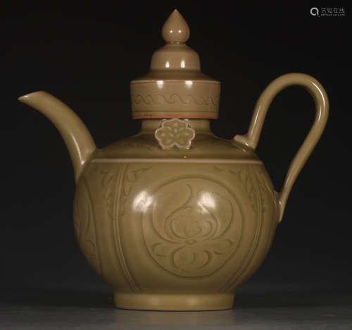 A YUE YAO BROWN GLAZE POT WITH FLOWER PATTERN