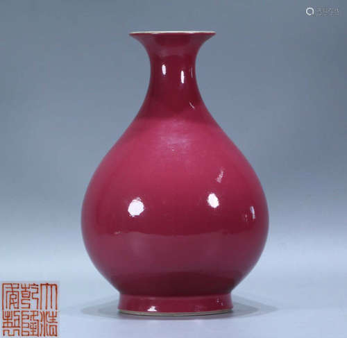 A RED GLAZE VASE WITH MARK