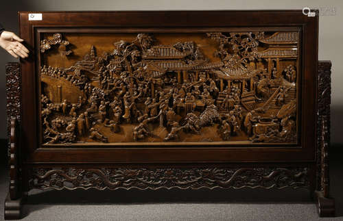 A WOOD SCREEN CARVED WITH STORY