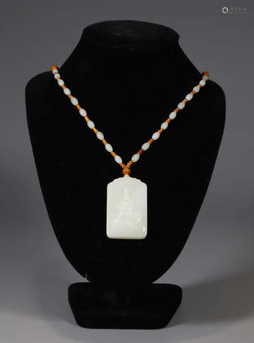 A HETIAN WHITE JADE PENDANT CARVED WITH GUANYIN BUDDHA