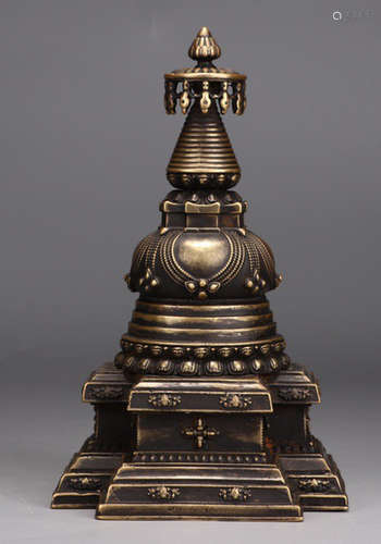 A COPPER PAGODA CARVED WITH PATTERN