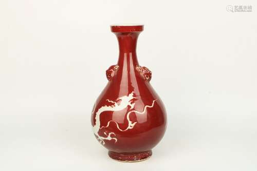 a chinese red glazed porcelain pear shaped vase