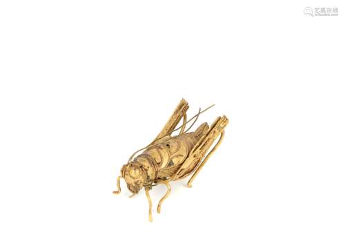 a chinese gilt painted insect ornament