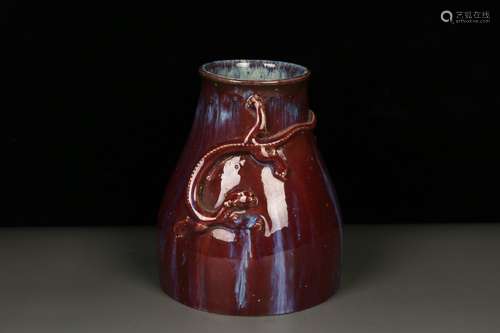 a chinese flambe glazed porcelain dragon pot