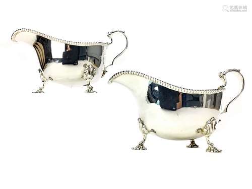 A PAIR OF EARLY 20TH CENTURY SILVER SAUCEBOATS