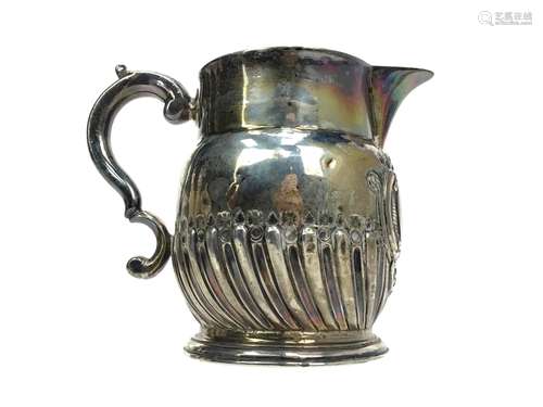 A SILVER CREAM JUG