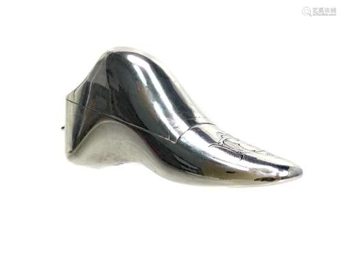 A VICTORIAN SILVER VESTA FORMED AS A BOOT