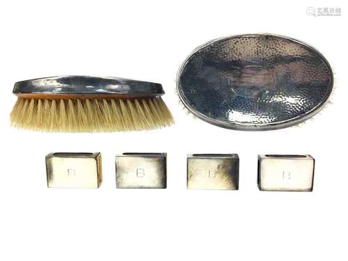 A LOT OF FOUR SILVER MATCHBOX HOLDERS AND TWO BRUSHES