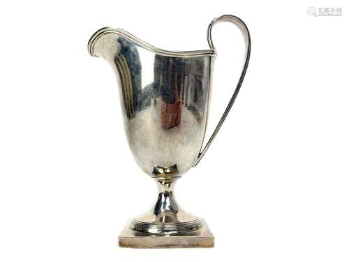 A GEORGE V SILVER CREAMER