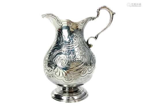 A SILVER CREAM JUG