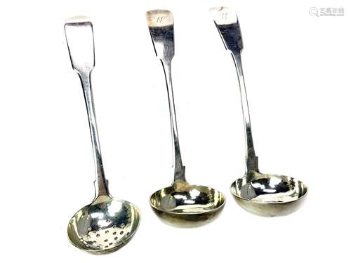 A GEORGE IV SILVER TEA STRAINER ALONG WITH TWO SAUCE LADLES