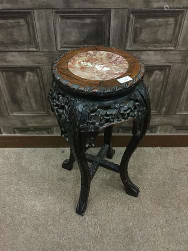 AN EARLY 20TH CENTURY CHINESE IRONWOOD PLANT TABLE