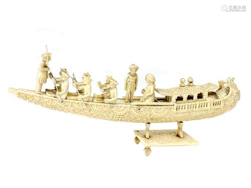 AN EARLY 20TH CENTURY INDIAN IVORY CARVING OF A BOAT