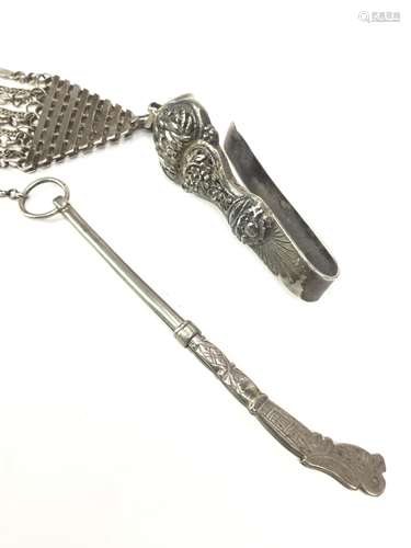 A CHINESE SILVER AND WHITE METAL CHATELAINE