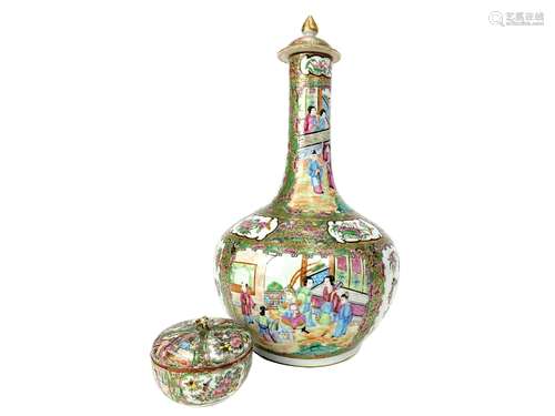 A CHINESE CANTON FAMILLE ROSE BOTTLE SHAPED VASE AND A LIDDED JAR AND A FAMILLE ROSE LIDDED JAR