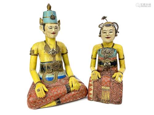 A LOT OF TWO INDONESIAN CARVED WOOD POLYCHROME FIGURES