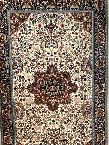 A 20TH CENTURY KIRMAN STYLE RUG