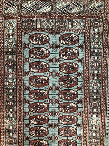 A 20TH CENTURY AFGHAN BOKHARA RUG