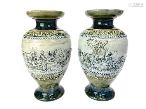 A PAIR OF ROYAL DOULTON LAMBETH STONEWARE VASES DECORATED BY HANNAH BARLOW