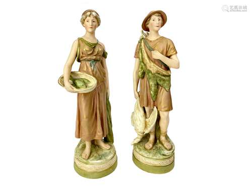 A PAIR OF ROYAL DUX FIGURES