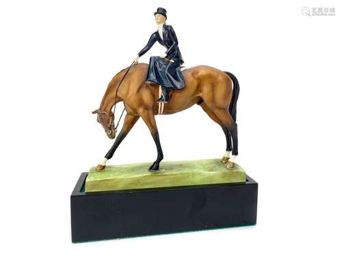 A ROYAL WORCESTER FIGURE OF A LADY ON HORSEBACK