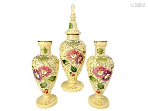 A GARNITURE OF THREE VICTORIAN GLASS VASES