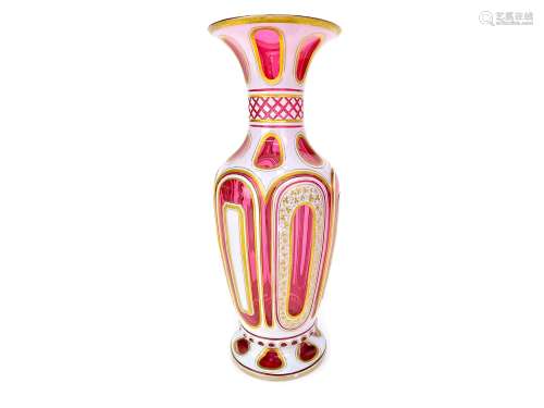 A LATE 19TH CENTURY BOHEMIAN CRANBERRY GLASS VASE