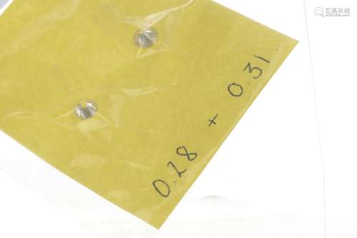 TWO UNMOUNTED ROUND BRILLIANT CUT DIAMONDS