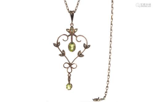 A GREEN GEM SET AND DIAMOND PENDANT