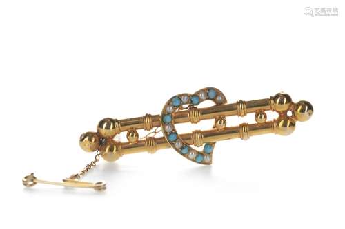 A TURQUOISE AND SEED PEARL BAR BROOCH