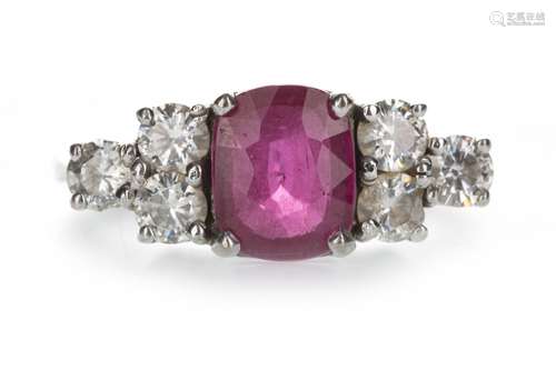 A PINK GEM SET AND MOISSANITE RING