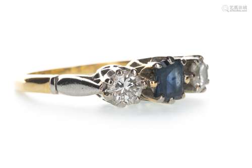 A BLUE GEM SET AND MOISSANITE THREE STONE RING