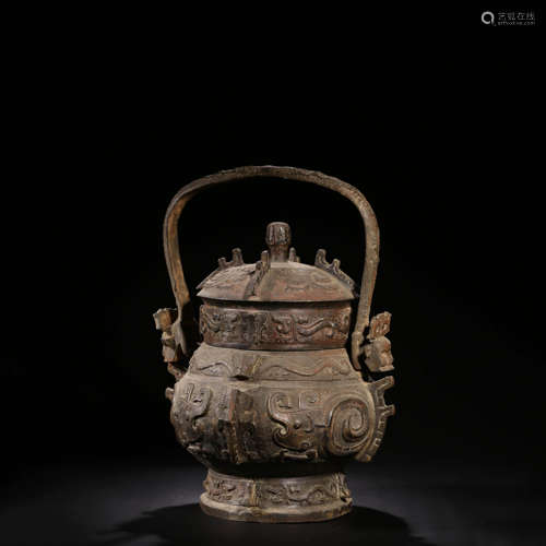 A Chinese Bronze Loop-handled Vessel