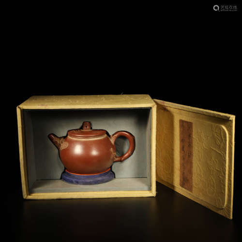 A Chinese Purple Sand Carved Teapot