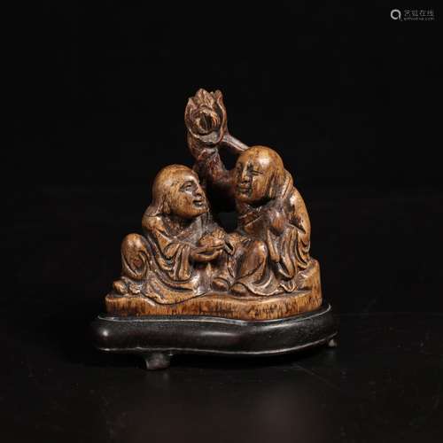 A Chinese Eaglewood Carved immortal Ornament