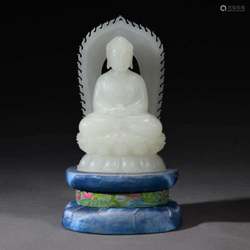 A Chinese White Jade Carved Sakyamuni Statue