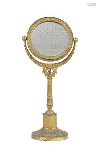 Miroir de toilette basculant en bronze doré, à déc…