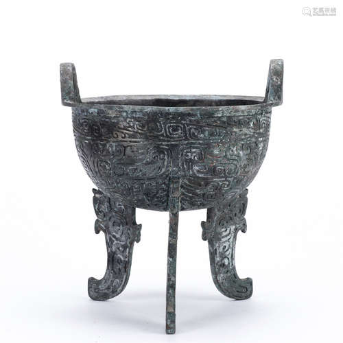 Bronze Taotie pattern tripod ware with two ears